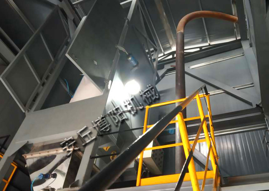 噸袋（dài）拆包機如何對粉料進行（háng）粉塵（chén）防控?